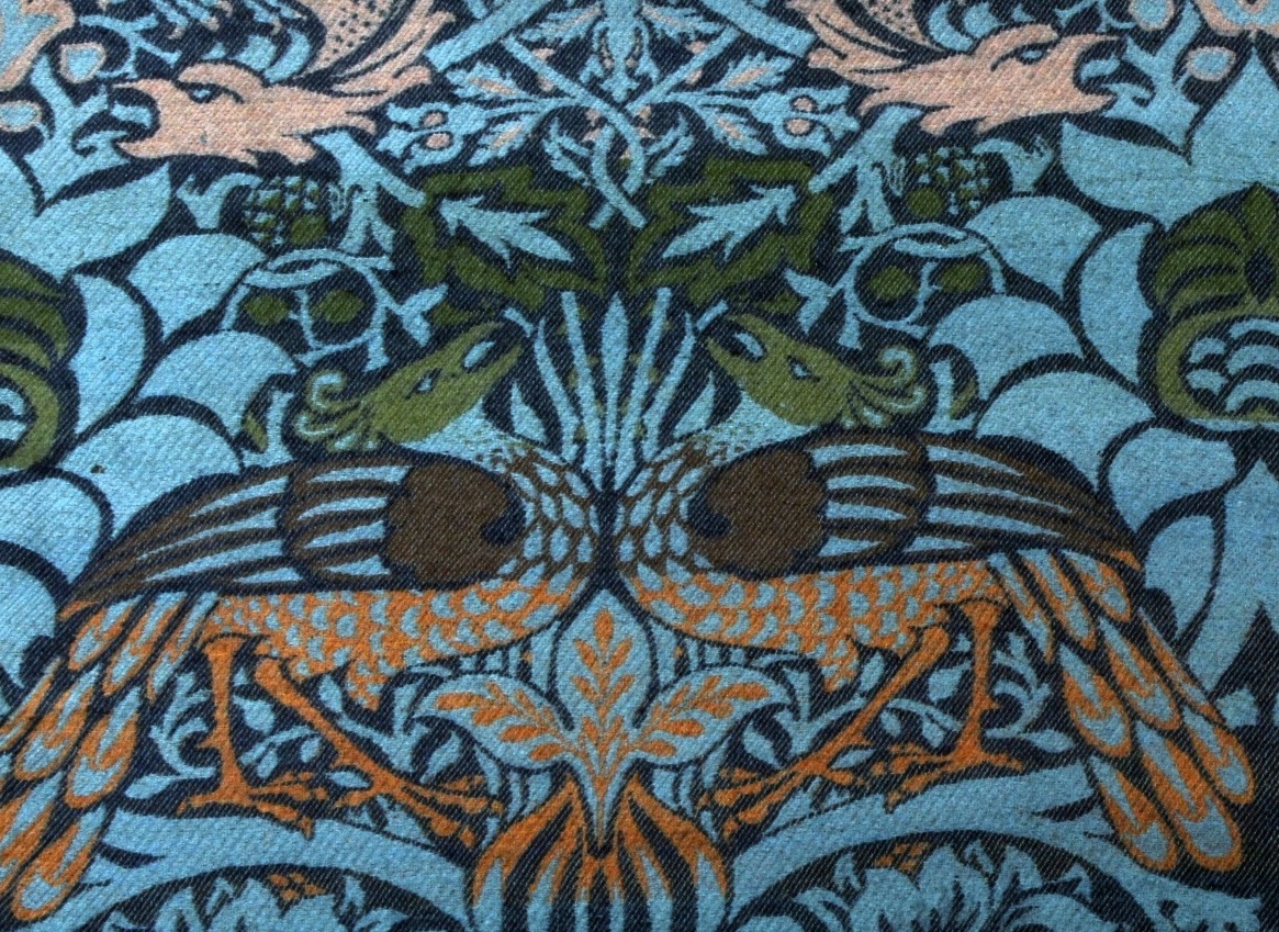 Close detail of the Peacock and Dragon design by William Morris