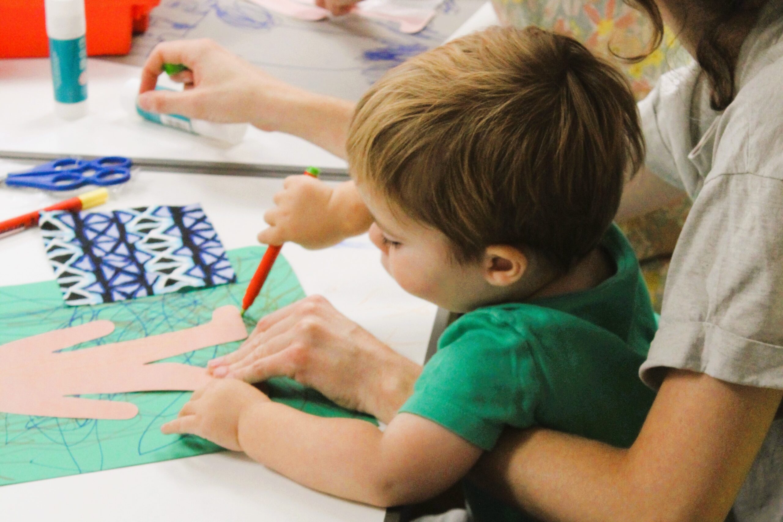 Toddler with parent in an art workshop at William Morris Gallery