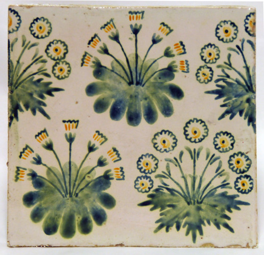 Square tile depicting clumps of daisies