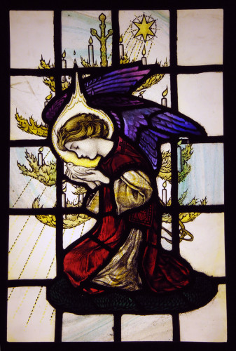 Stained glass panel of an angel kneeling