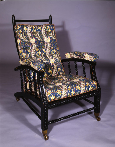 mahogany adjustable back armchair upholstered in daffodil chintz