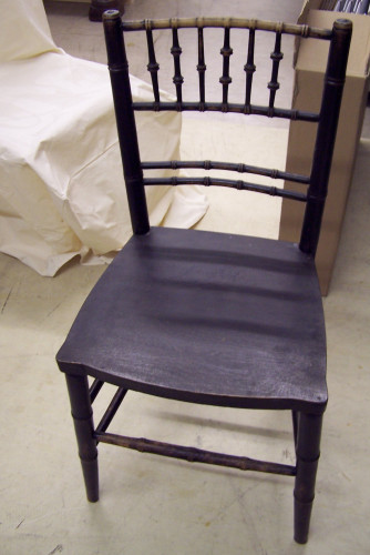 single brown wooden chair