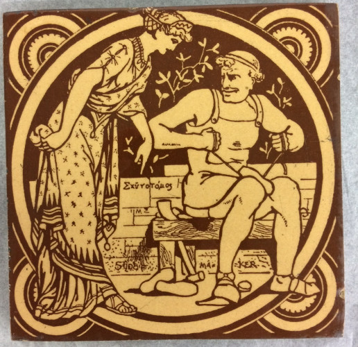 yellow and brown tile showing shoemaker at work while woman looks on