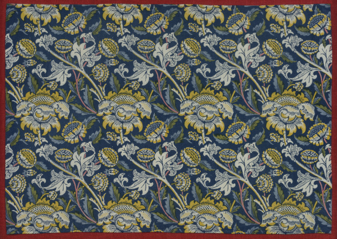 Yellow and blue floral design on a dark blue background
