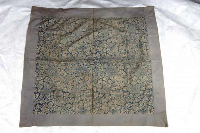square blue fabric with bird and anenome pattern