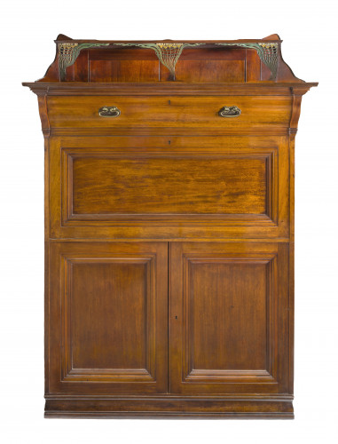 Wooden cabinet with intricate fret-work brackets