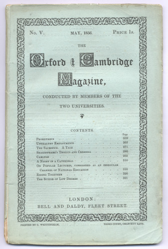 Green paper magazine cover with decorative border and ornate capitals