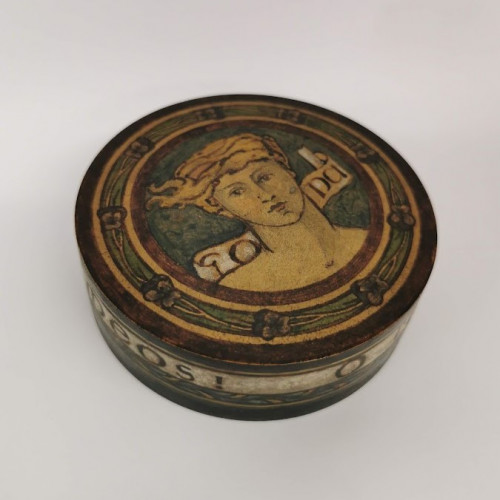 Painted wooden box showing face and Latin inscription