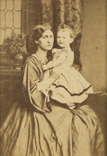 Photograph of Jane Morris with a young May Morris on her knee