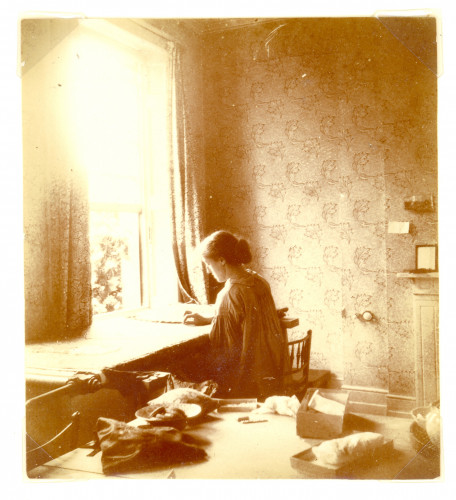 Photograph of May Morris embroidering