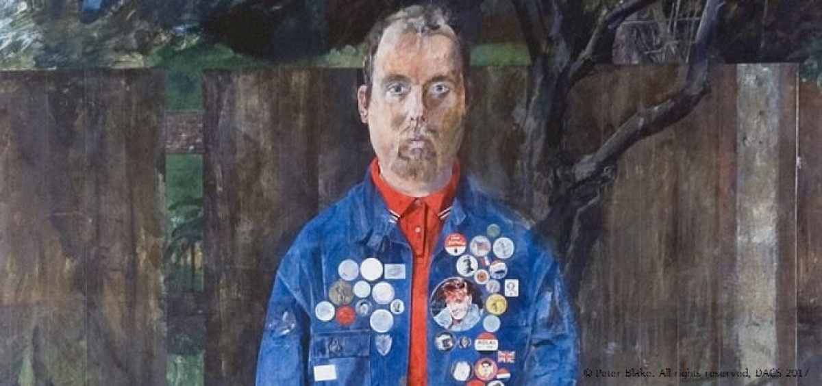 Self-portrait of Peter Blake showing head and upper body. He is wearing a denim jacket covered in badges