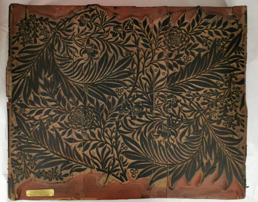 Carved wooden block with floral pattern